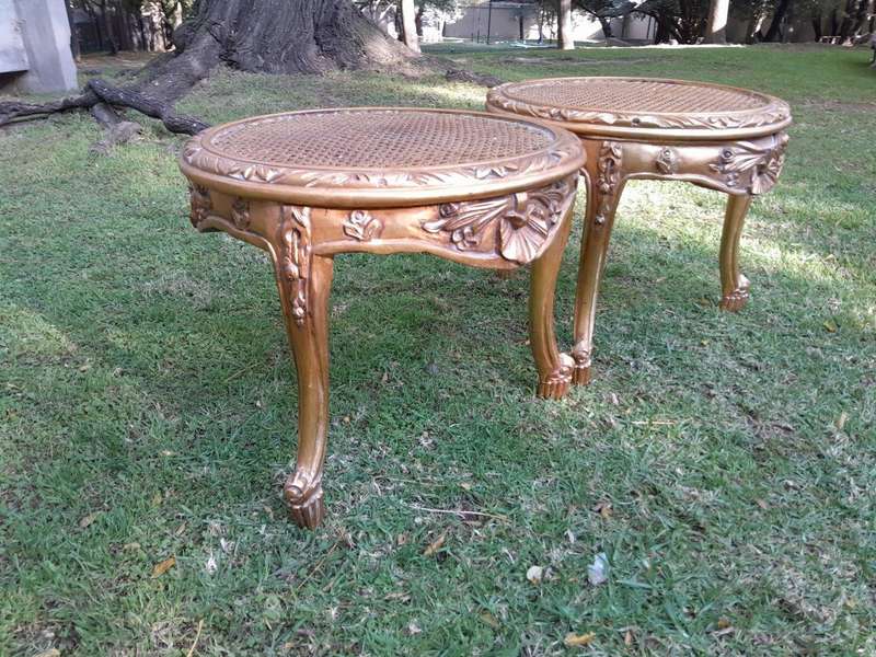 A Pair of French Style Carved Round Side Tables with Rattan Tops