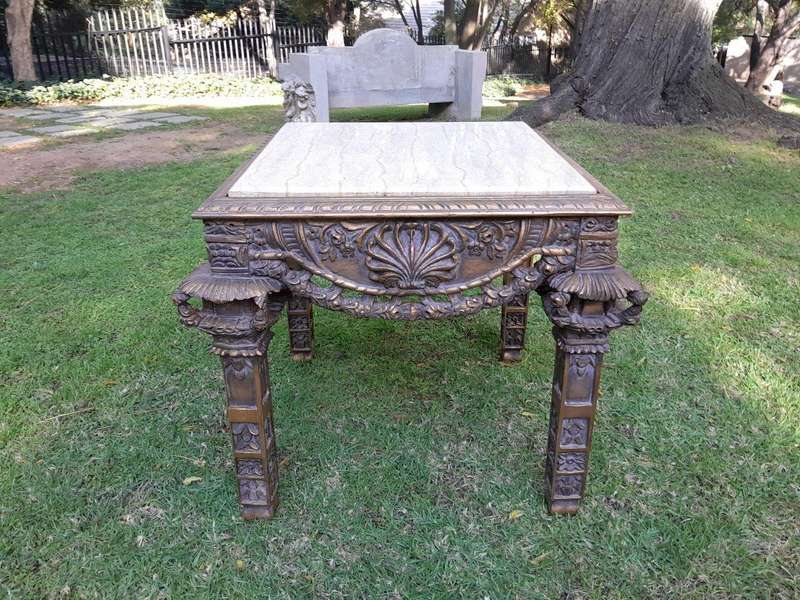 A 20th Century French Style Ornately Carved And Gilded Table / Side Table with Cream Marble Top
