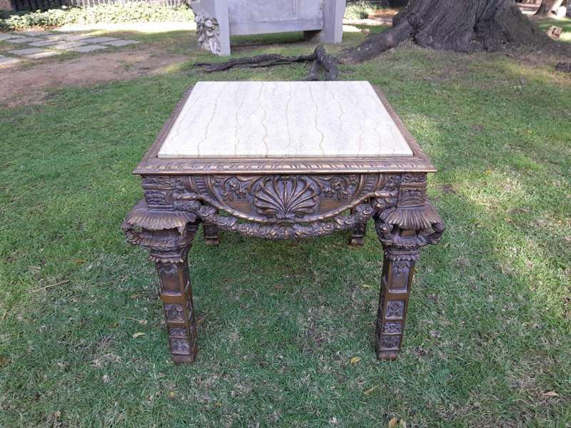 A 20th Century French Style Ornately Carved And Gilded Table / Side Table with Cream Marble Top