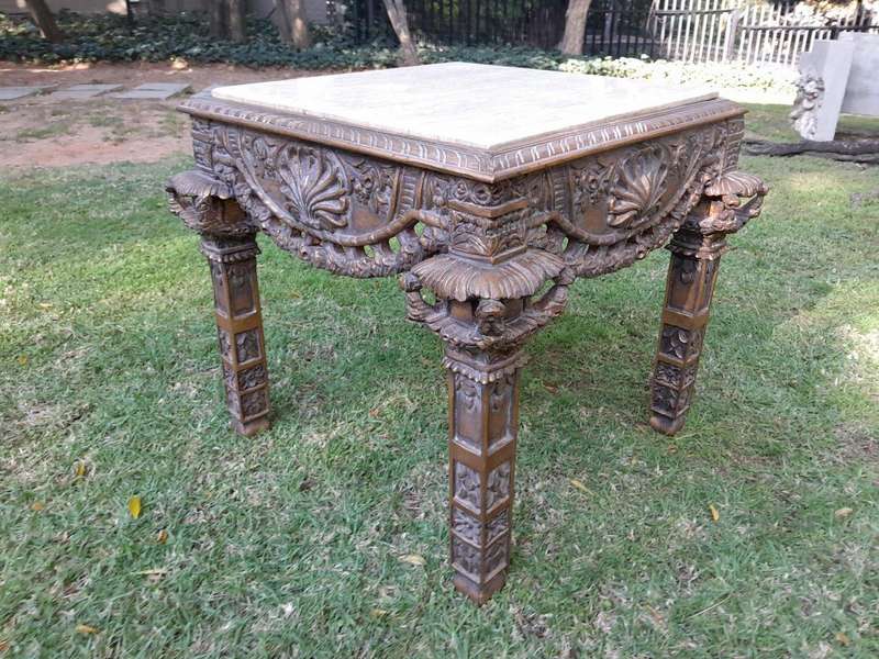 A 20th Century French Style Ornately Carved And Gilded Table / Side Table with Cream Marble Top
