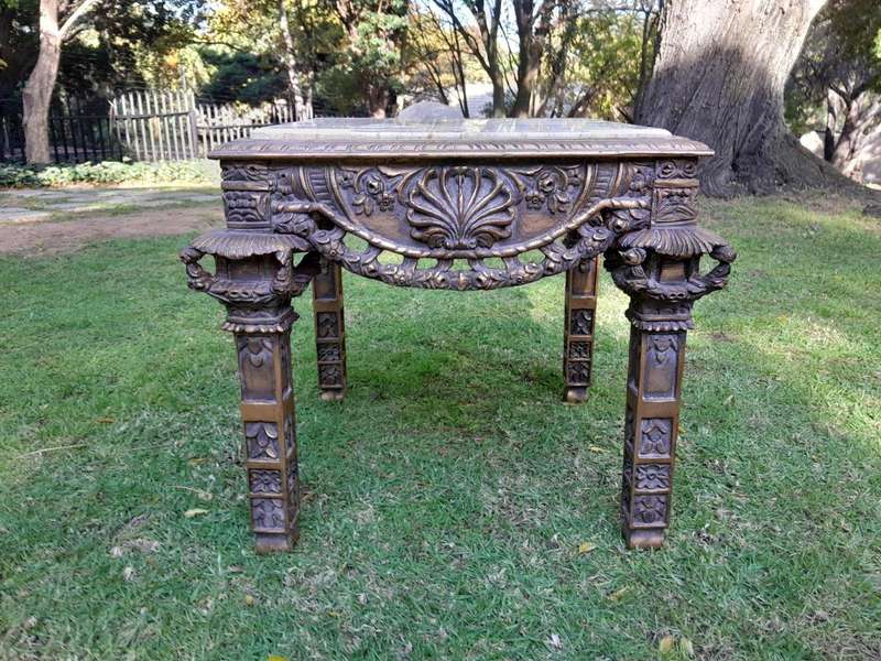 A 20th Century French Style Ornately Carved And Gilded Table / Side Table with Cream Marble Top
