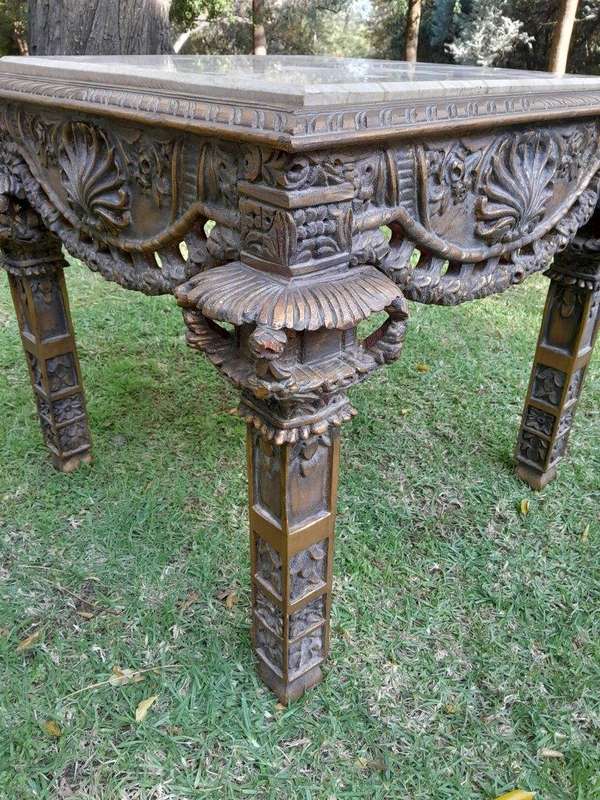 A 20th Century French Style Ornately Carved And Gilded Table / Side Table with Cream Marble Top