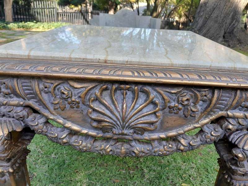 A 20th Century French Style Ornately Carved And Gilded Table / Side Table with Cream Marble Top