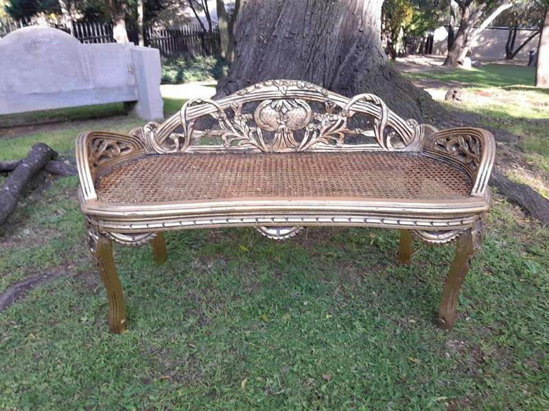 A French Style Ornately Carved and Hand- Gilded Rattan Bench / Settee