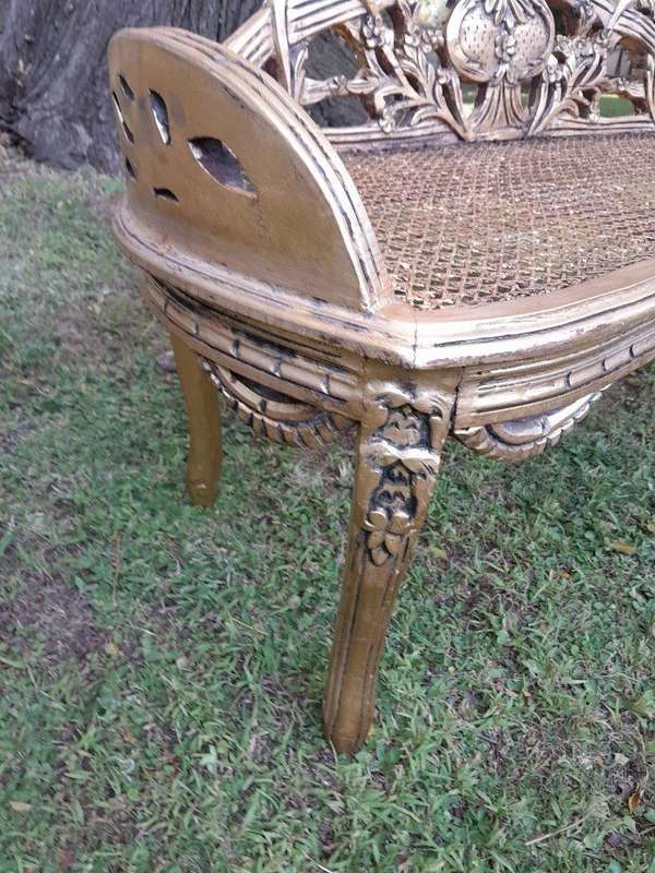 A French Style Ornately Carved and Hand- Gilded Rattan Bench / Settee