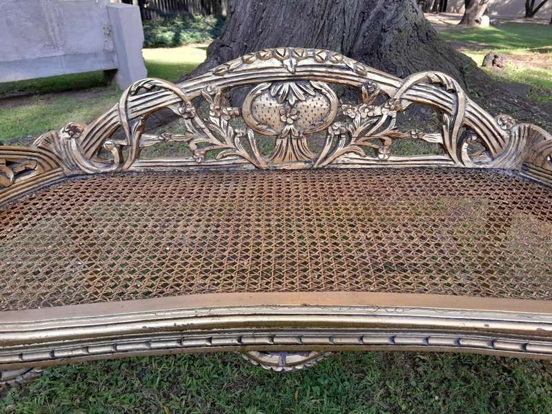 A French Style Ornately Carved and Hand- Gilded Rattan Bench / Settee