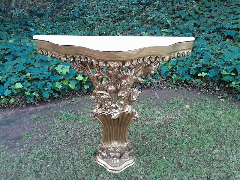 A Pair of Large French Style Carved and Gilded Wall Sconces Or Console Tables with Cream Marble Tops