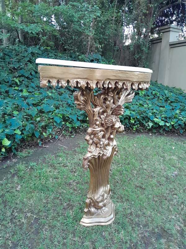 A Pair of Large French Style Carved and Gilded Wall Sconces Or Console Tables with Cream Marble Tops