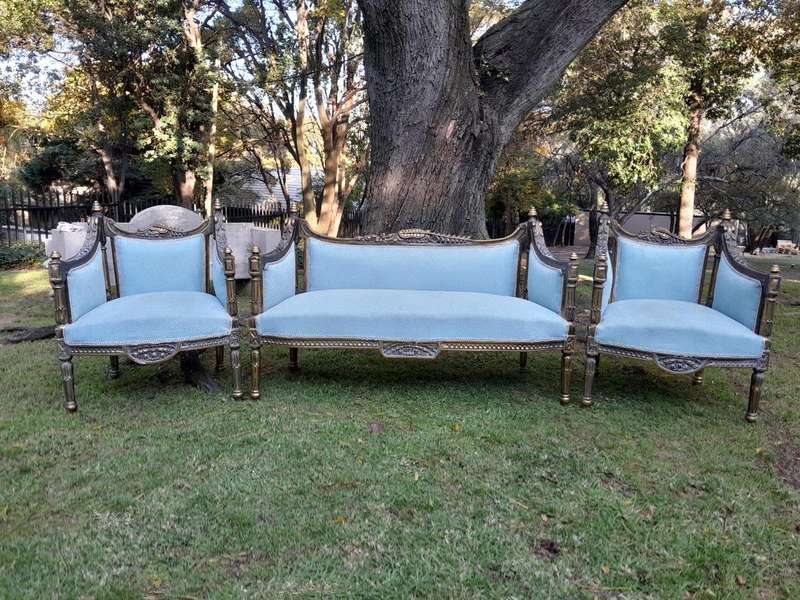 A 20th Century French Style Set of  A Pair of Armchairs and a Settee