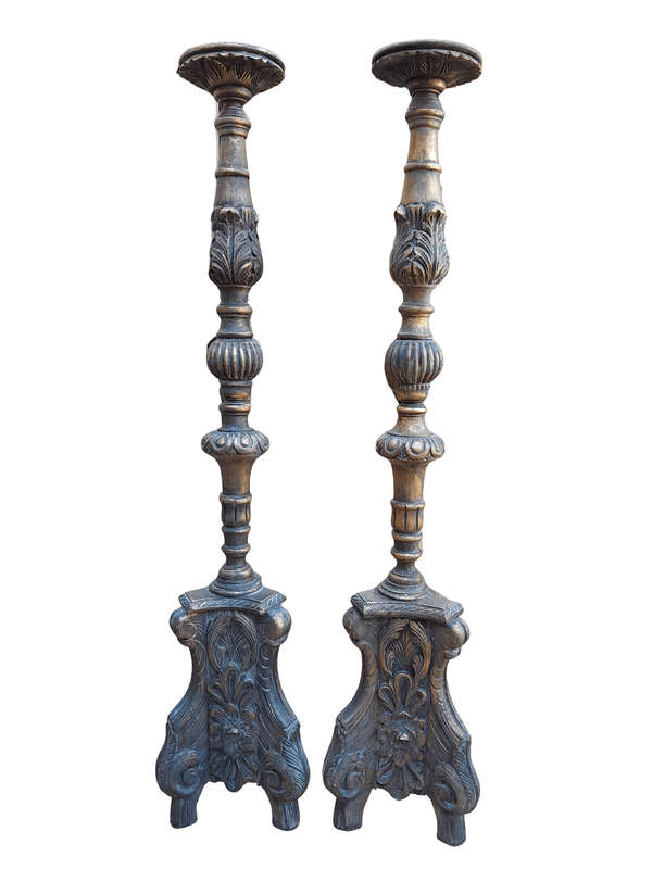 A Pair Of French Style Carved And Gilded Floor Or Table Candle Holders