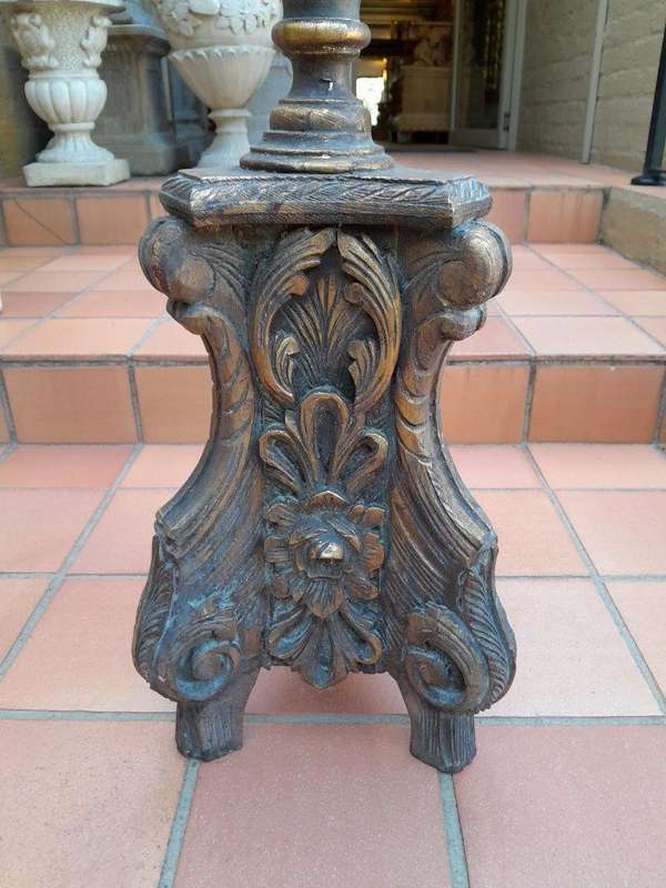 A Pair Of French Style Carved And Gilded Floor Or Table Candle Holders