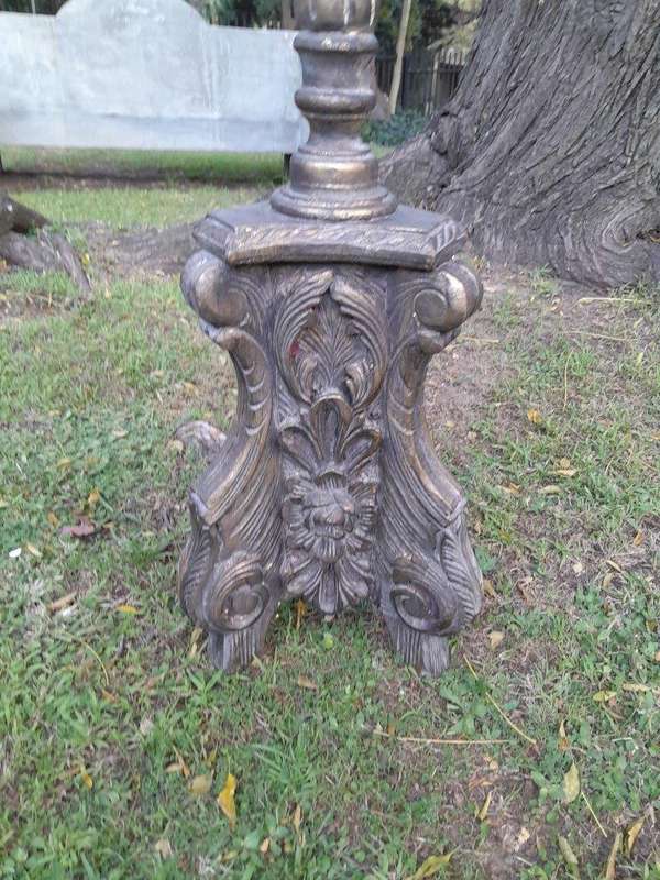 A Pair of French Style Carved and Gilded Floor or Table Candle Holders