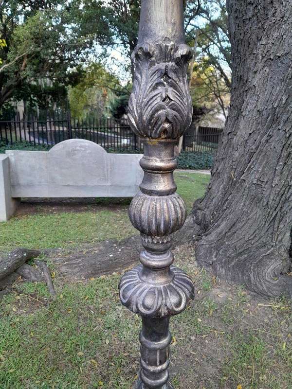 A Pair of French Style Carved and Gilded Floor or Table Candle Holders