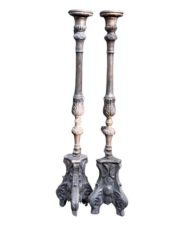 A Pair of French Style Carved and Gilded Floor or Table Candle Holders