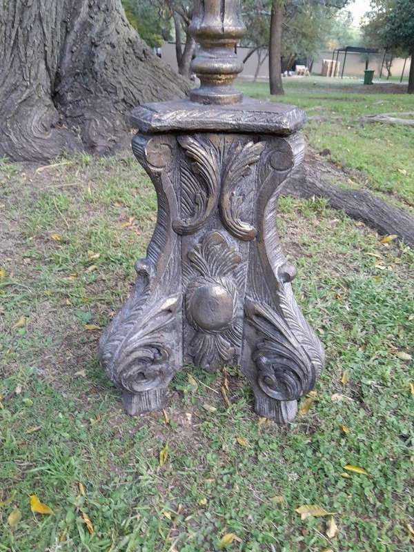 A Pair of French Style Carved and Gilded Floor or Table Candle Holders