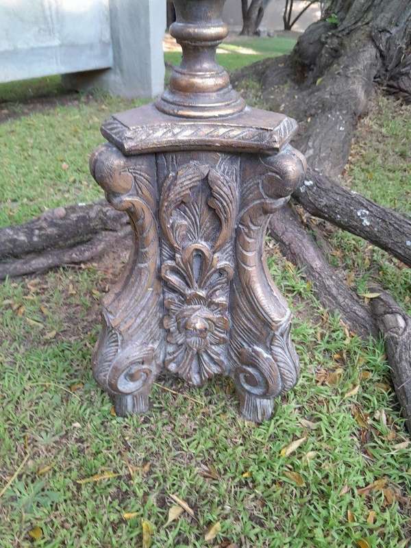 A Pair of French Style Carved and Gilded Floor or Table Candle Holders