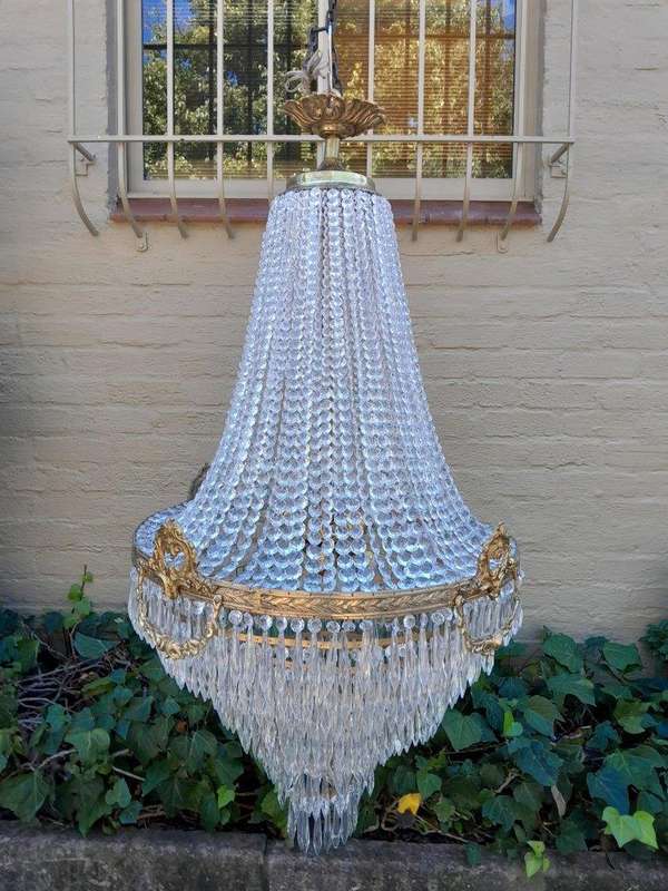 A French Empire Style Brass & Crystal Chandelier