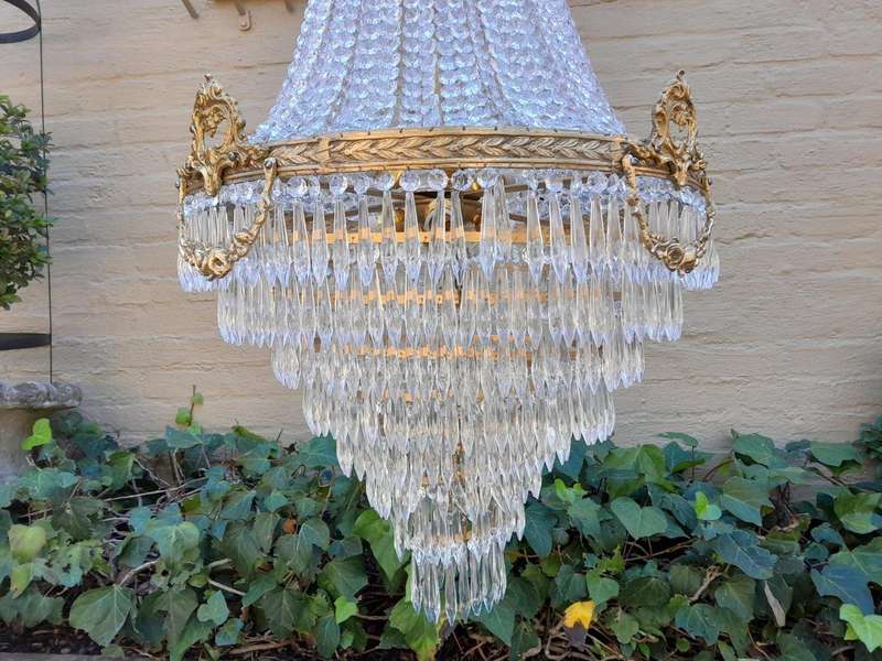 A French Empire Style Brass & Crystal Chandelier
