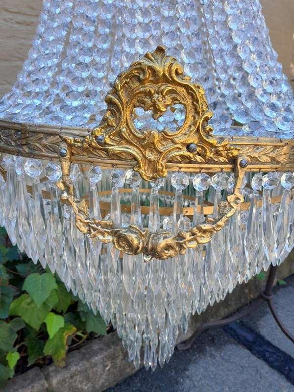 A French Empire Style Brass & Crystal Chandelier