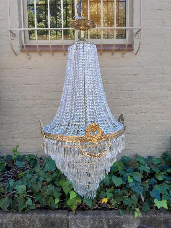 A French Empire Style Brass & Crystal Chandelier