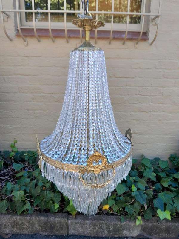 A French Empire Style Brass & Crystal Chandelier
