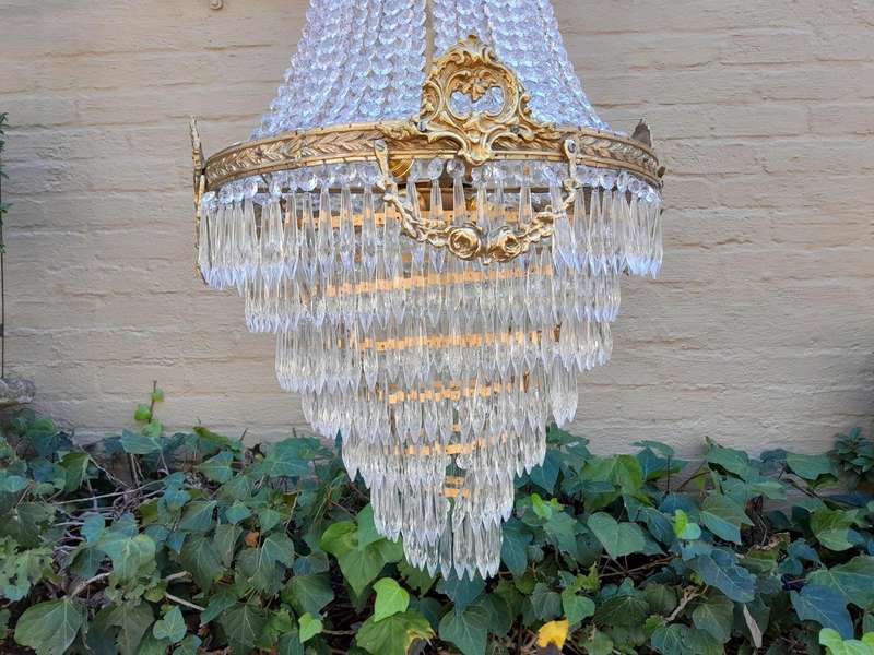 A French Empire Style Brass & Crystal Chandelier