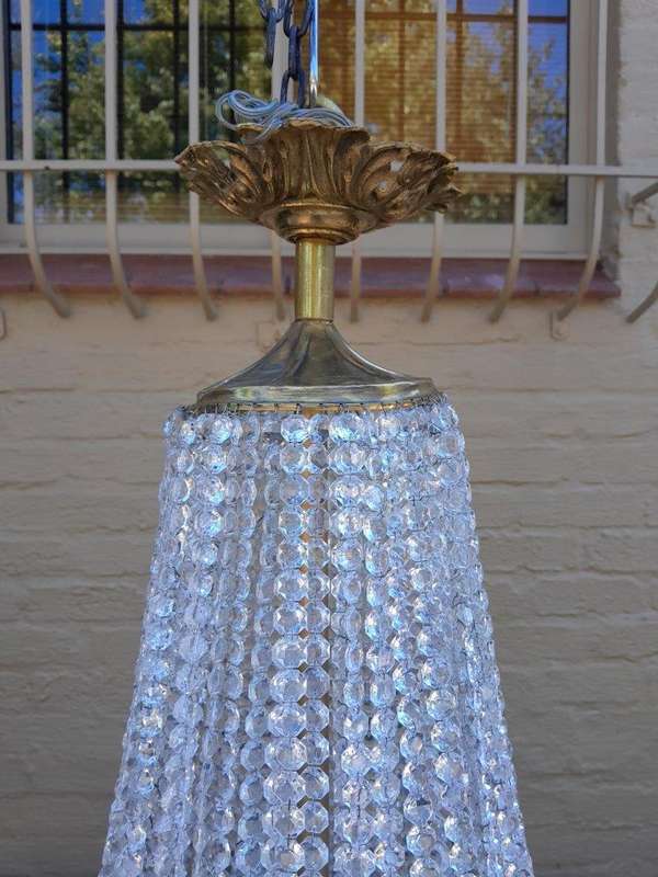 A French Empire Style Brass & Crystal Chandelier