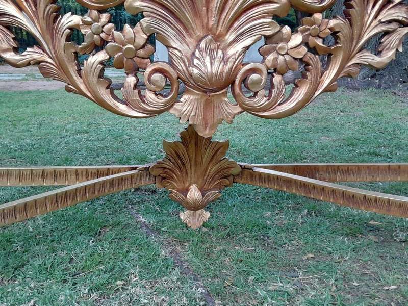 A 20th Century Ornately Carved and Hand-Gilded Console Table of Large Proportion with Cream Marbl...