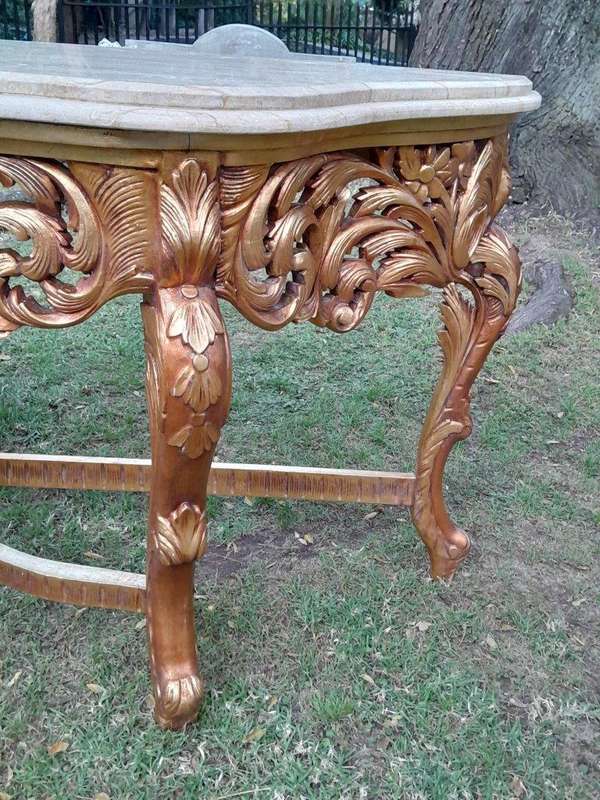 A 20th Century Ornately Carved and Hand-Gilded Console Table of Large Proportion with Cream Marbl...