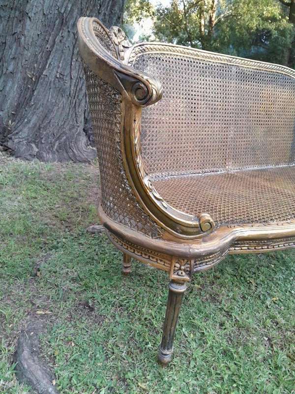 A French Louis XVI Style Carved and Giltwood Rattan Settee
