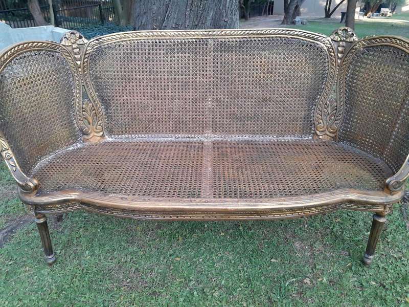 A French Louis XVI Style Carved and Giltwood Rattan Settee