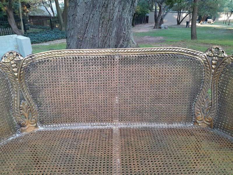 A French Louis XVI Style Carved and Giltwood Rattan Settee