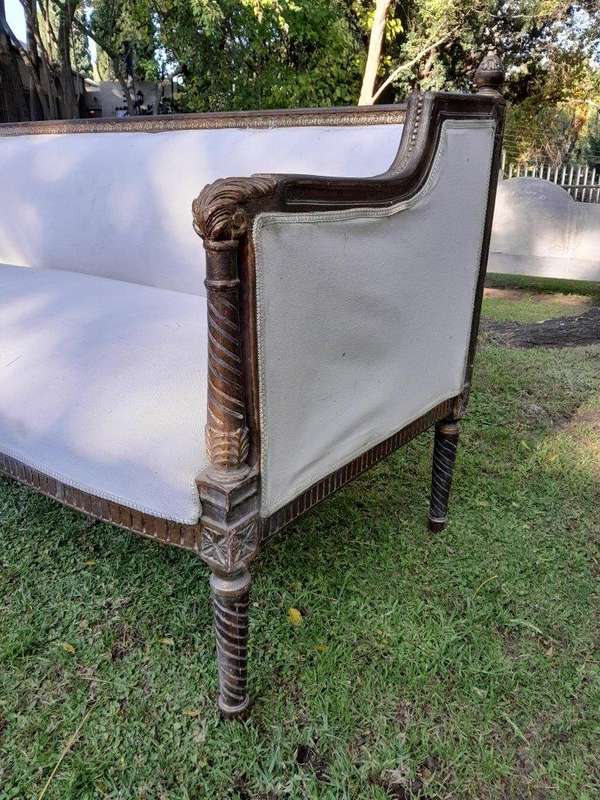 A French Louis XVI Style Large Carved Giltwood Settee