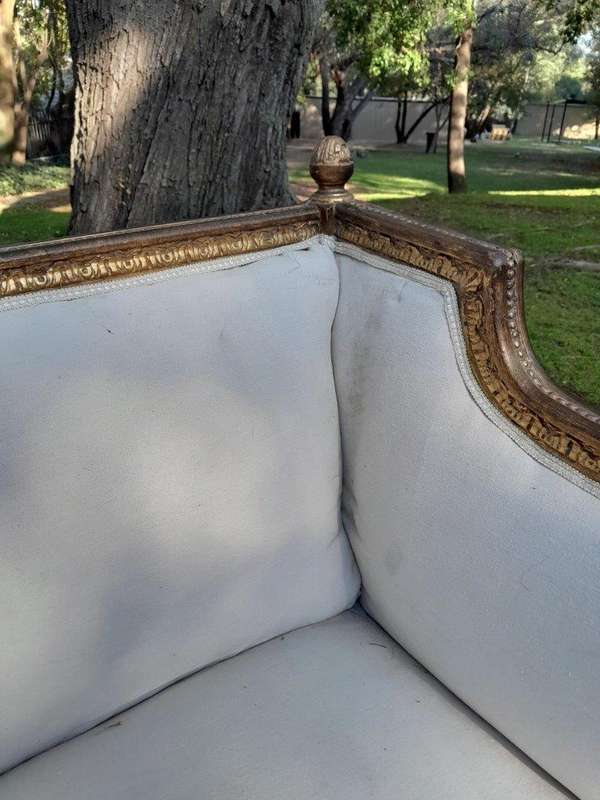 A French Louis XVI Style Large Carved Giltwood Settee