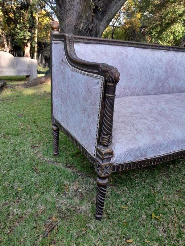 A French Louis XVI Style Large Carved Giltwood Settee