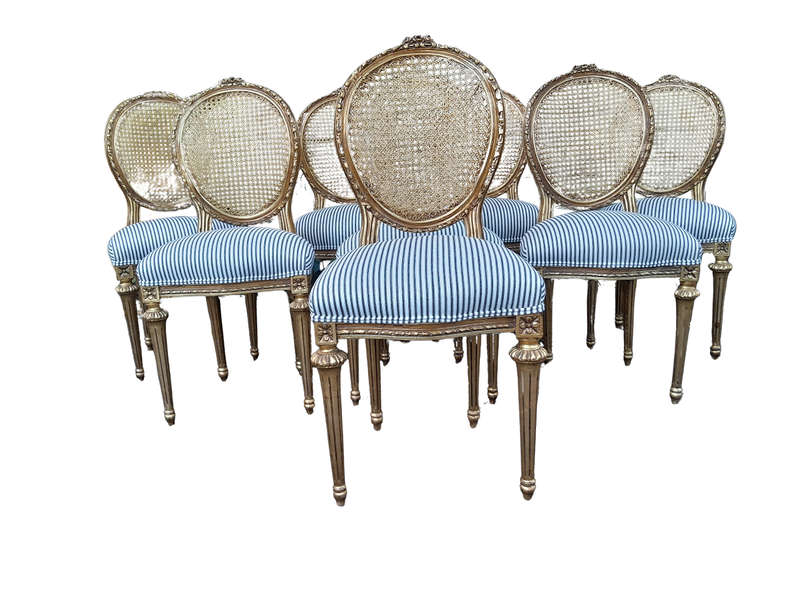 A Set of Eight French Style Carved Balloon and Rattan Back Chairs Upholstered in a Contemporary F...