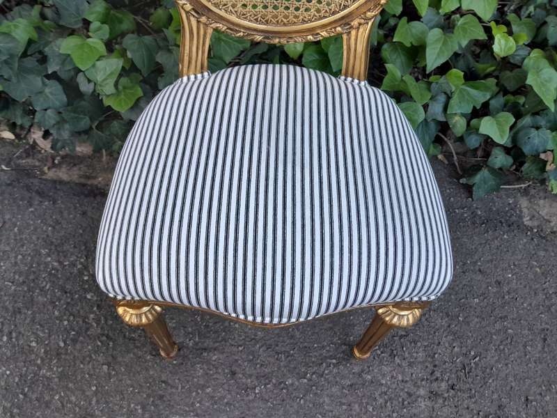 A Set of Eight French Style Carved Balloon and Rattan Back Chairs Upholstered in a Contemporary F...