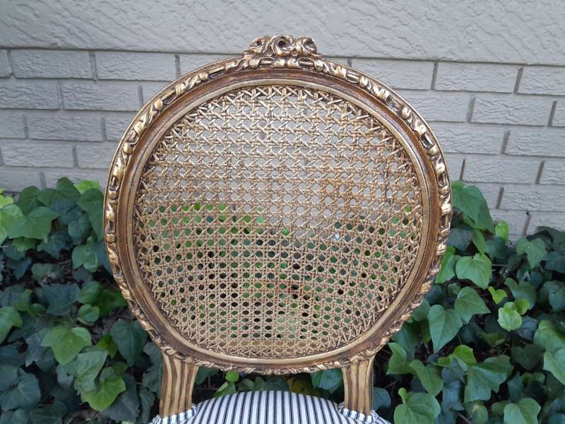 A Set of Eight French Style Carved Balloon and Rattan Back Chairs Upholstered in a Contemporary F...