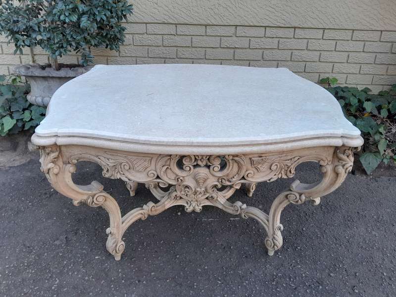 A 19th Century Ornately Carved Rococo Style Table with Marble Top in a Contemporary Bleached / Na...