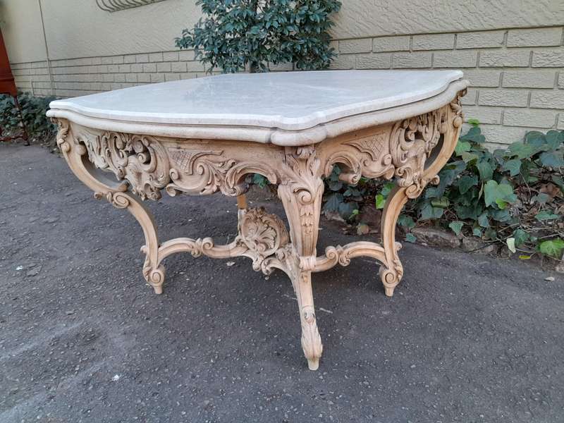 A 19th Century Ornately Carved Rococo Style Table with Marble Top in a Contemporary Bleached / Na...