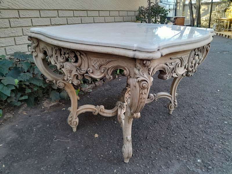 A 19th Century Ornately Carved Rococo Style Table with Marble Top in a Contemporary Bleached / Na...