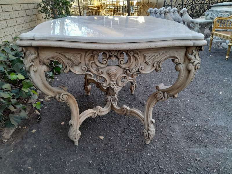 A 19th Century Ornately Carved Rococo Style Table with Marble Top in a Contemporary Bleached / Na...