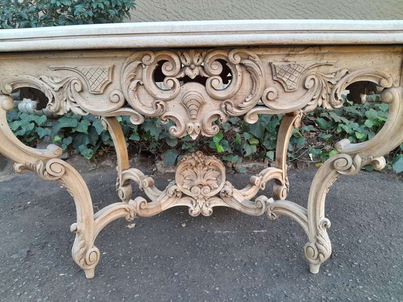 A 19th Century Ornately Carved Rococo Style Table with Marble Top in a Contemporary Bleached / Na...