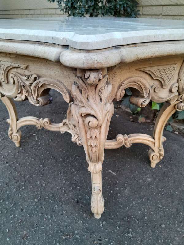 A 19th Century Ornately Carved Rococo Style Table with Marble Top in a Contemporary Bleached / Na...