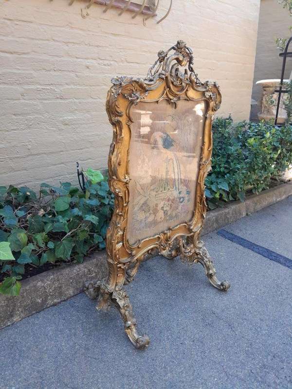 A 20TH Century French Louis XV Style Ornately Carved Giltwood Fire Screen With Tapestry
