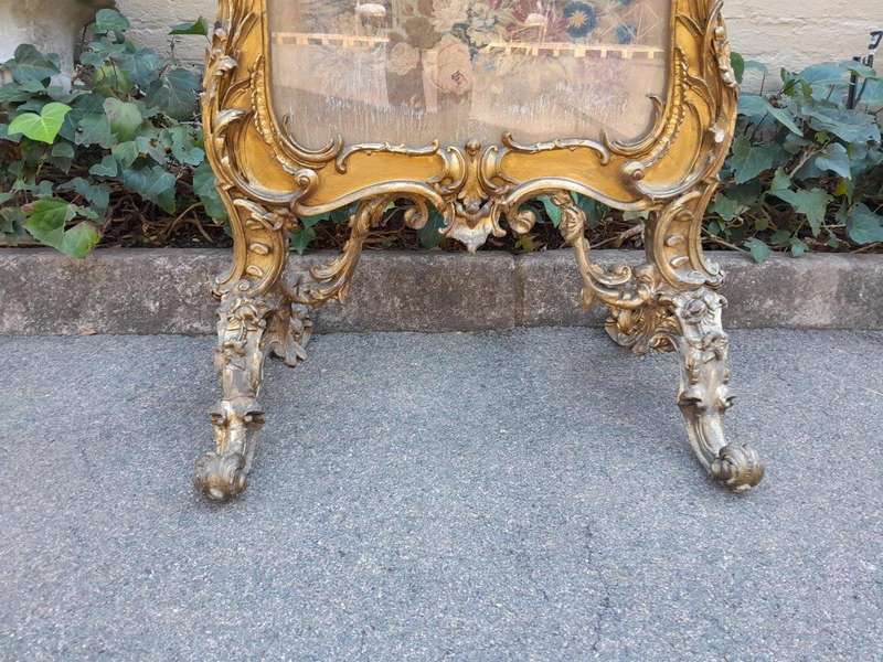 A 20TH Century French Louis XV Style Ornately Carved Giltwood Fire Screen With Tapestry