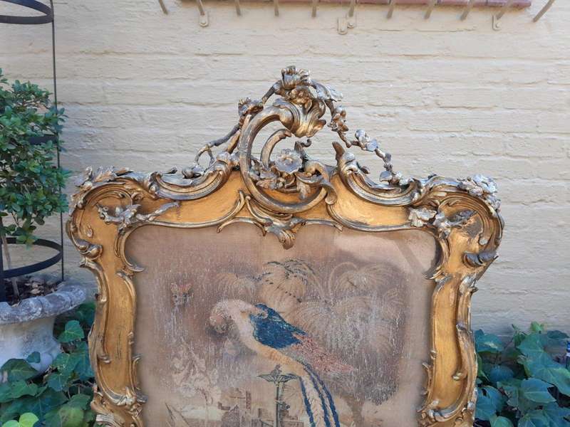 A 20TH Century French Louis XV Style Ornately Carved Giltwood Fire Screen With Tapestry