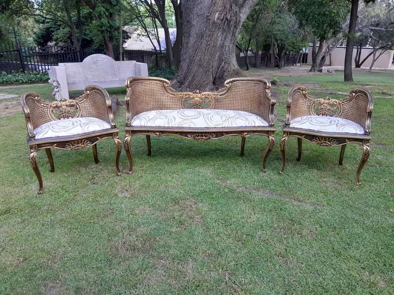 A 20TH Century French Louis XVI Style Giltwood Rattan Settee and Two Matching Bergere Chairs Upho...