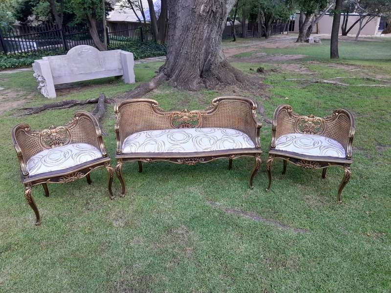 A 20TH Century French Louis XVI Style Giltwood Rattan Settee and Two Matching Bergere Chairs Upho...