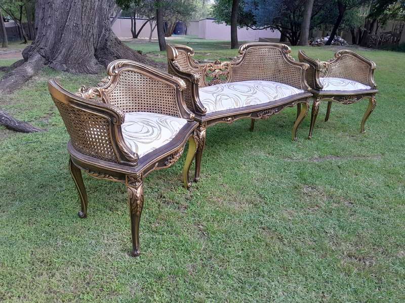 A 20TH Century French Louis XVI Style Giltwood Rattan Settee and Two Matching Bergere Chairs Upho...